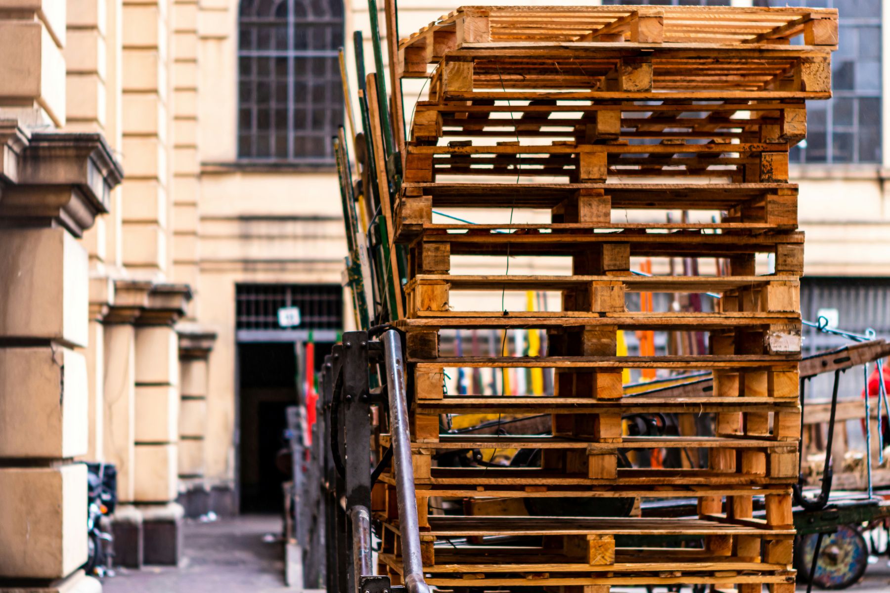 Bulk lot of pallets stacked in the Al Sajaa yard